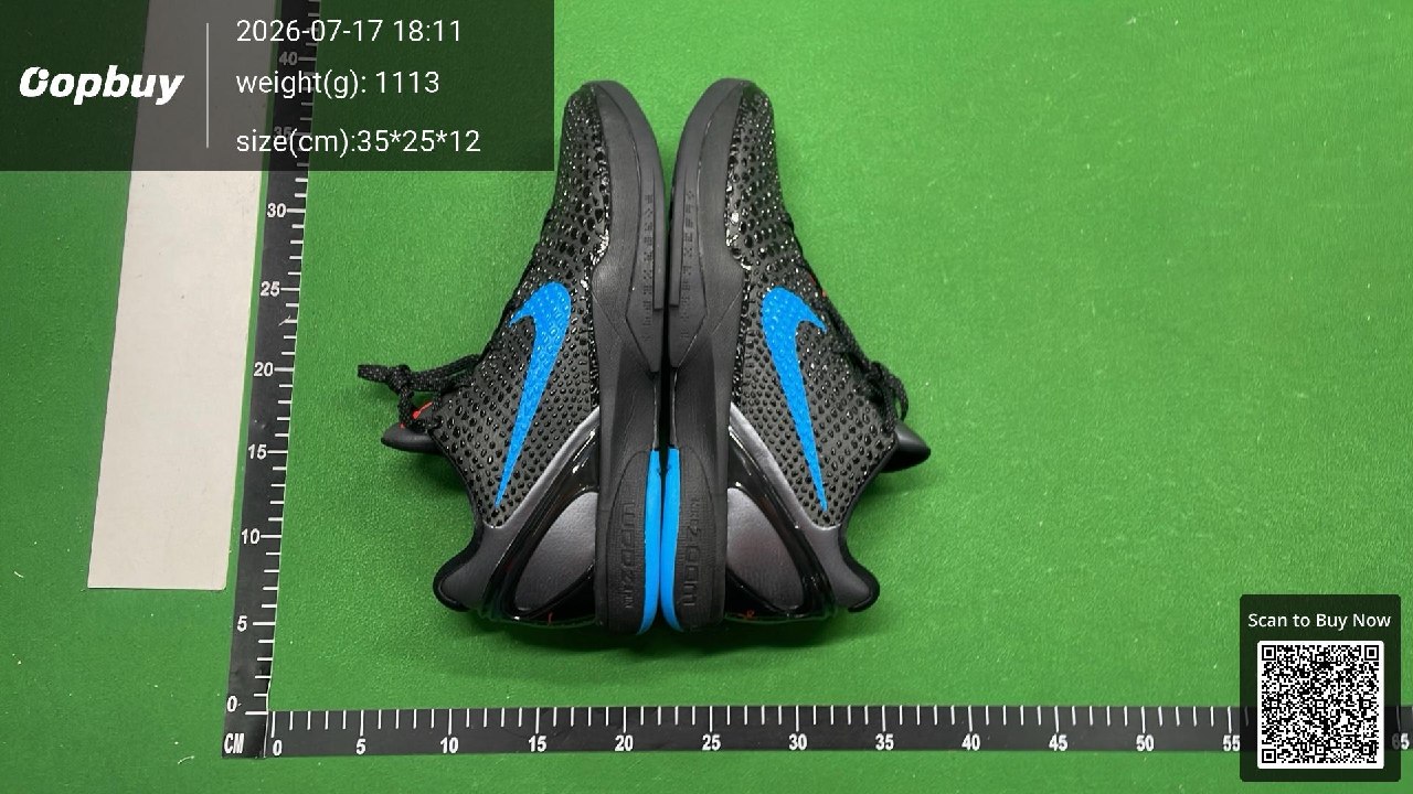 Outer side of the same black and blue sneaker pair