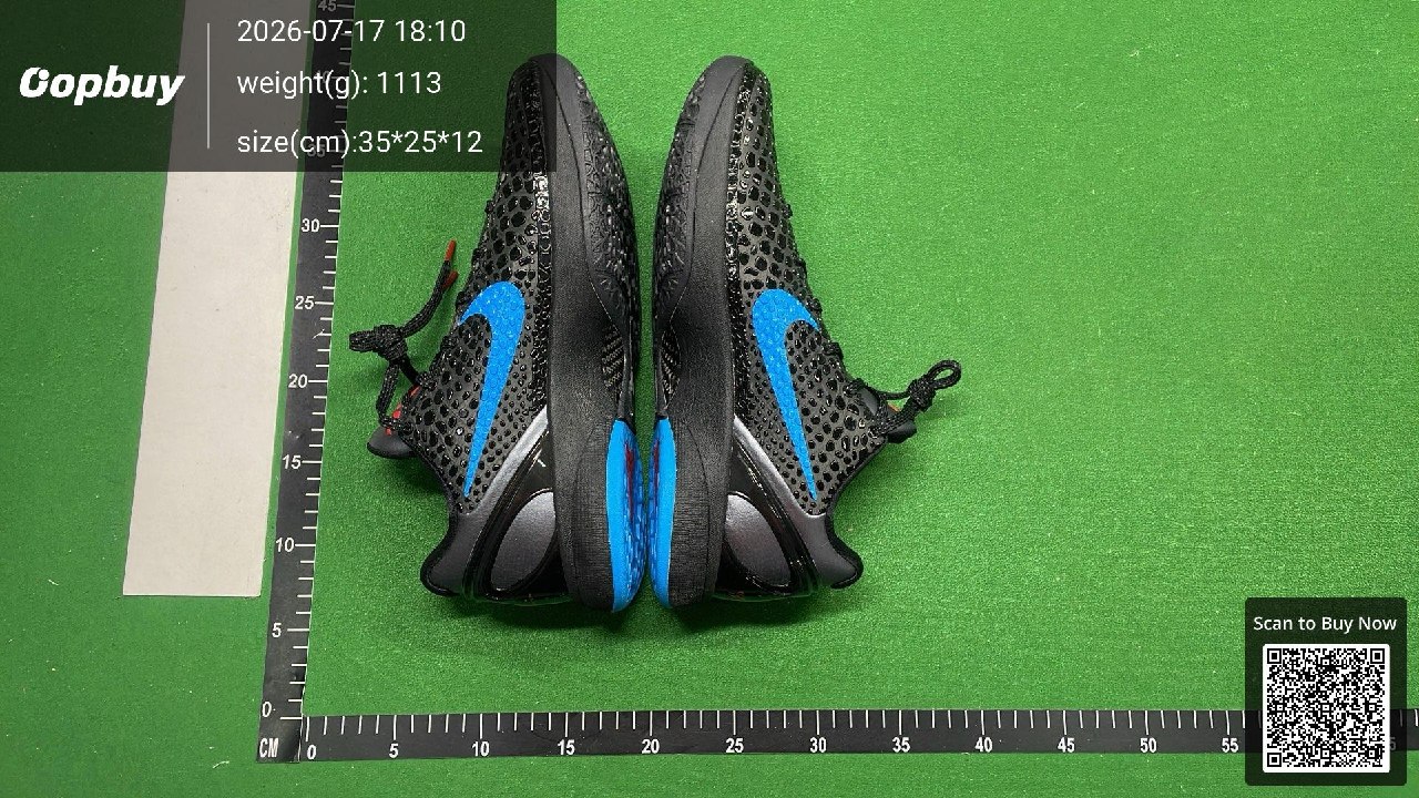 Inner side of the black and blue sneaker pair, both shoes shown from the same side